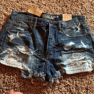 Distressed American eagle high rise jean short
